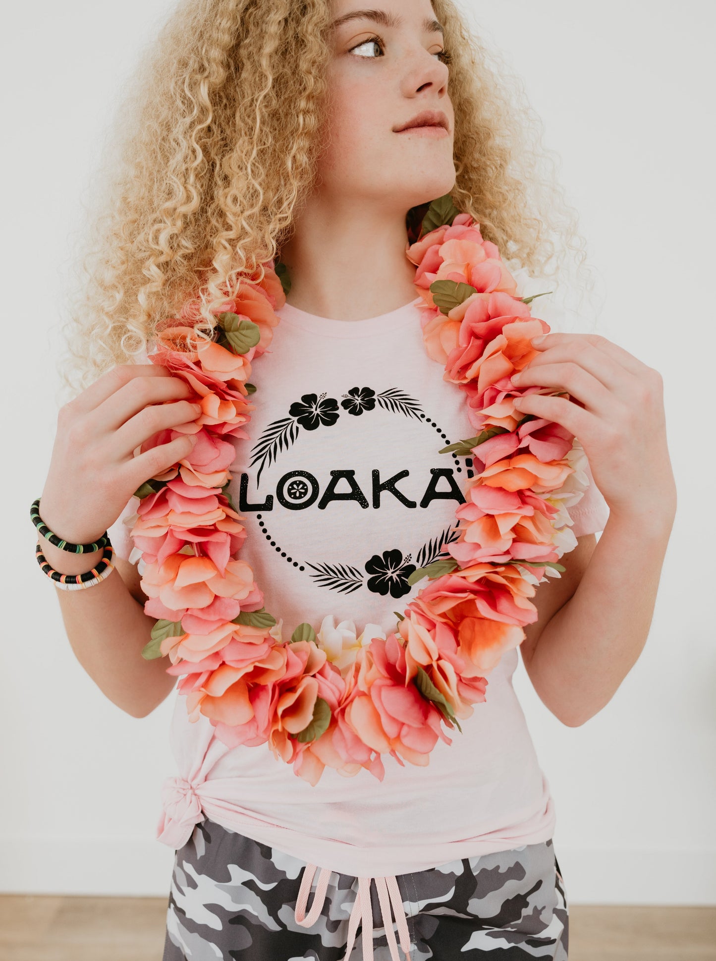 PINK LEI women's fashion triblend short sleeve T-shirt is the perfect accessory to make any occasion special. Crafted from a lightweight, breathable fabric, it offers a relaxed fit that is both cool and comfortable. Finished in a vibrant pink hue, it is a great choice for a gift or special occasion.