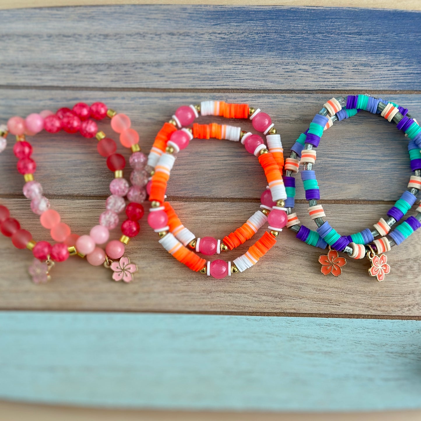 SUMMERTIME STRETCH BRACELET - the perfect accessory for your summer adventures. Handmade with convenience in mind, this stylish and unique bracelet is easy to put on and take off, adding a touch of fun to all your summer moments. Don't miss out on this must-have piece of jewelry!