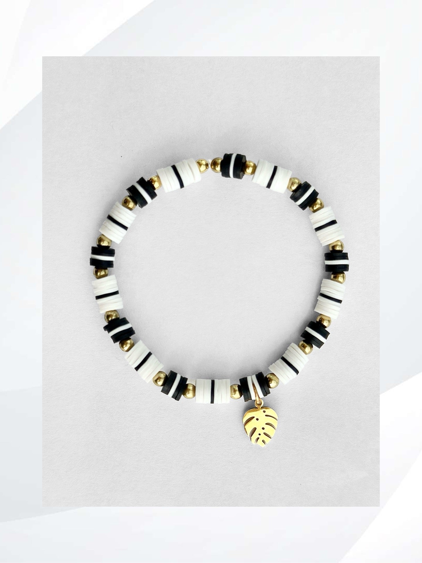 The WHITE GOLD PALM Stretch Bracelet gives off an Aloha vibe. Handmade jewelry that is easy on and off, stylish, fun and unique.