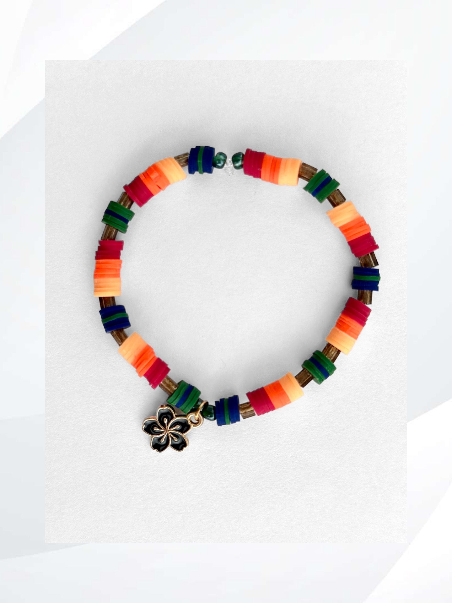 BLACK HIBISCUS Stretch Bracelet is a rare and delicate beauty with its multi-colored pattern and captivating flower charm. Handmade jewelry that is easy on and off, stylish, fun and unique.