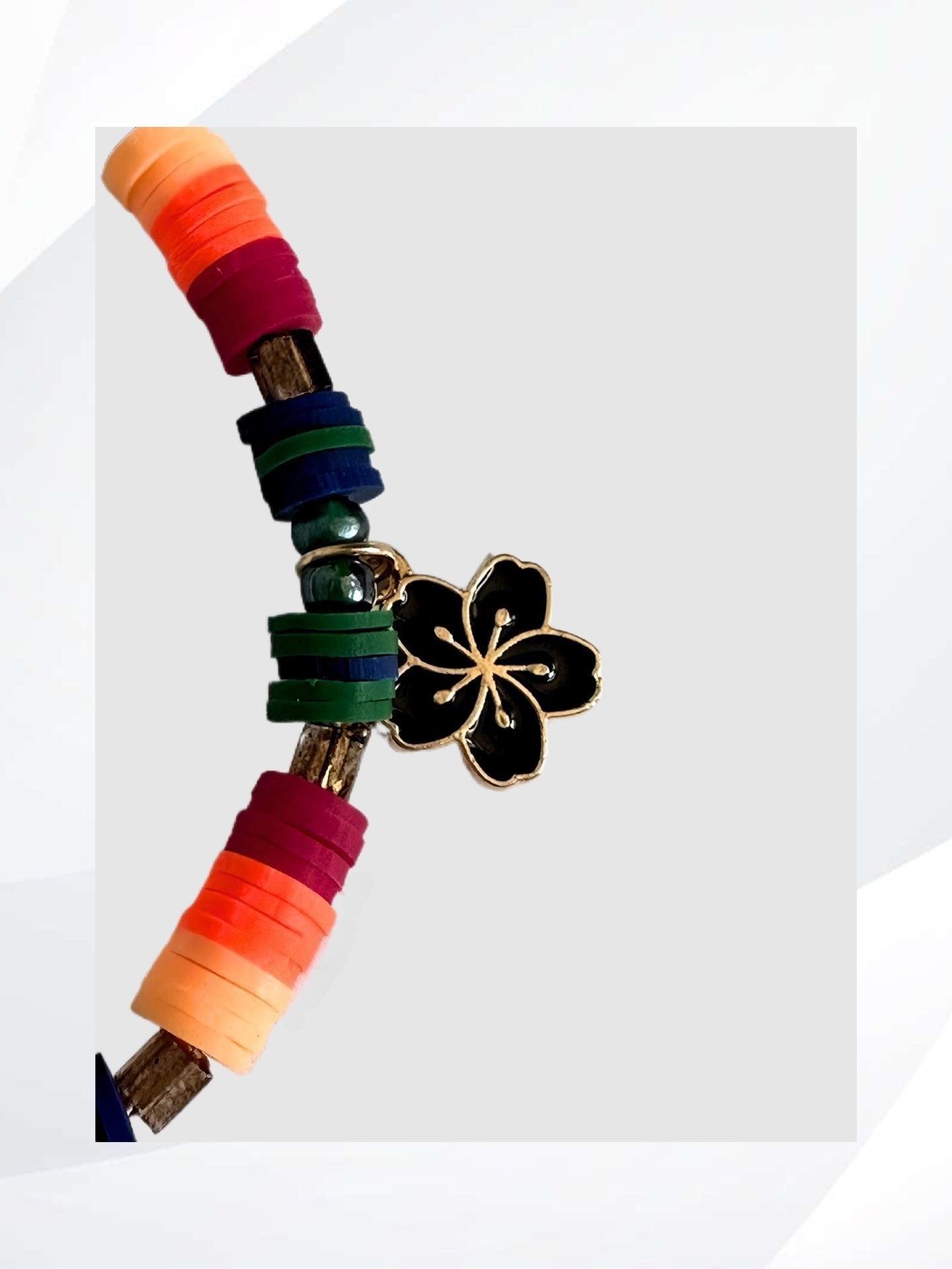 BLACK HIBISCUS Stretch Bracelet is a rare and delicate beauty with its multi-colored pattern and captivating flower charm. Handmade jewelry that is easy on and off, stylish, fun and unique.