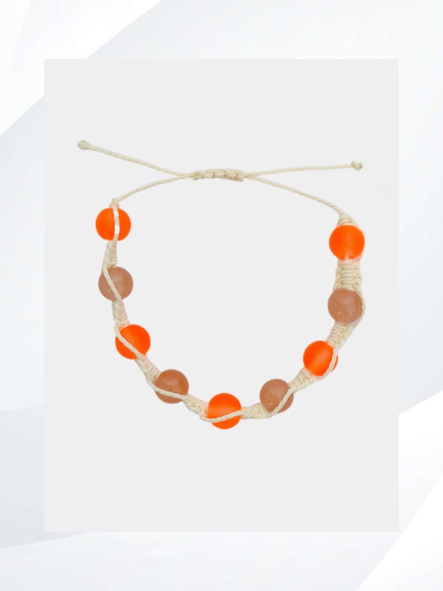 This SUNSET ORANGE BRACELET features an adjustable tie cord and a convenient on and off design, adding a stylish touch with its vivid sunset orange beads. Handmade jewelry that is fun and unique.