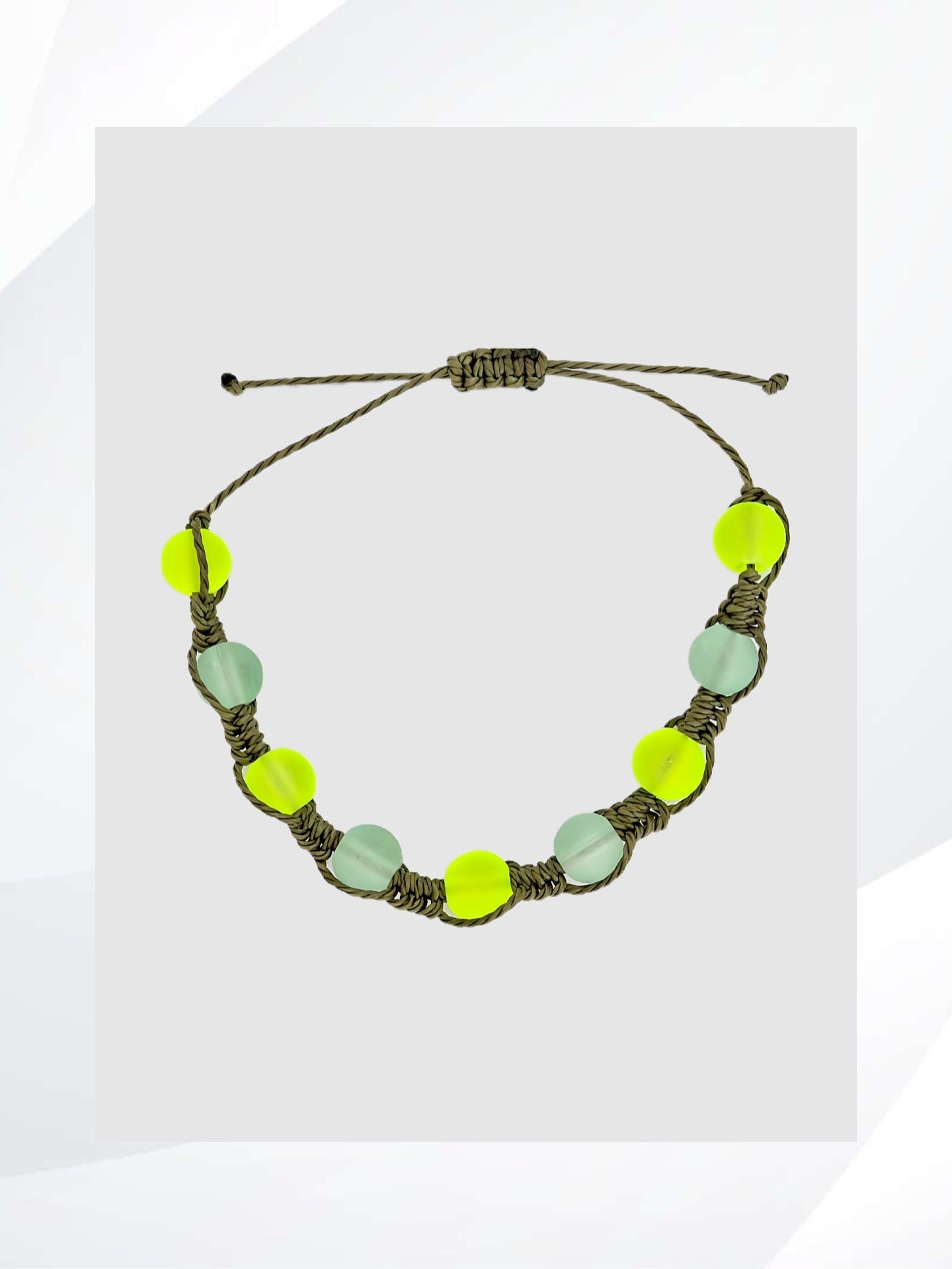 This SEA FOAM GREEN BRACELET features an adjustable tie cord and a convenient on and off design, adding a stylish touch with its vivid sea foam green beads. Handmade jewelry that is fun and unique.